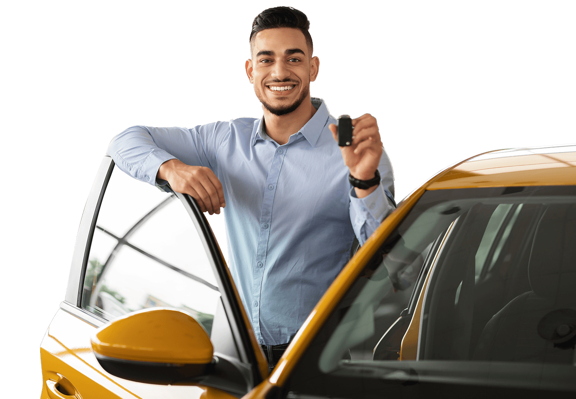 A man holding a car key in front of a yellow car, ready to embark on a journey.